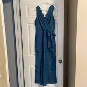 Women’s jumpsuit. Denim with scallop neckline.